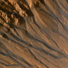 False-color image of gully channels in a crater in the southern highlands of Mars