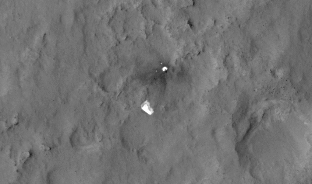 This sequence of images shows a blast zone where the sky crane from NASA's Curiosity rover mission hit the ground after setting the rover down in August 2012, and how that dark scar's appearance changed over the subsequent 30 months. The images are from HiRISE on NASA's Mars Reconnaissance Orbiter.
