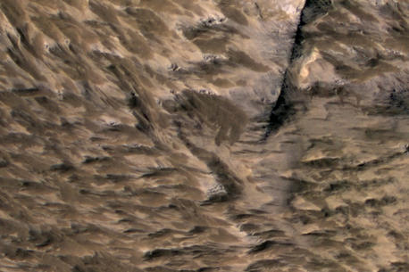 Landslides Near Fresh Crater on Mars