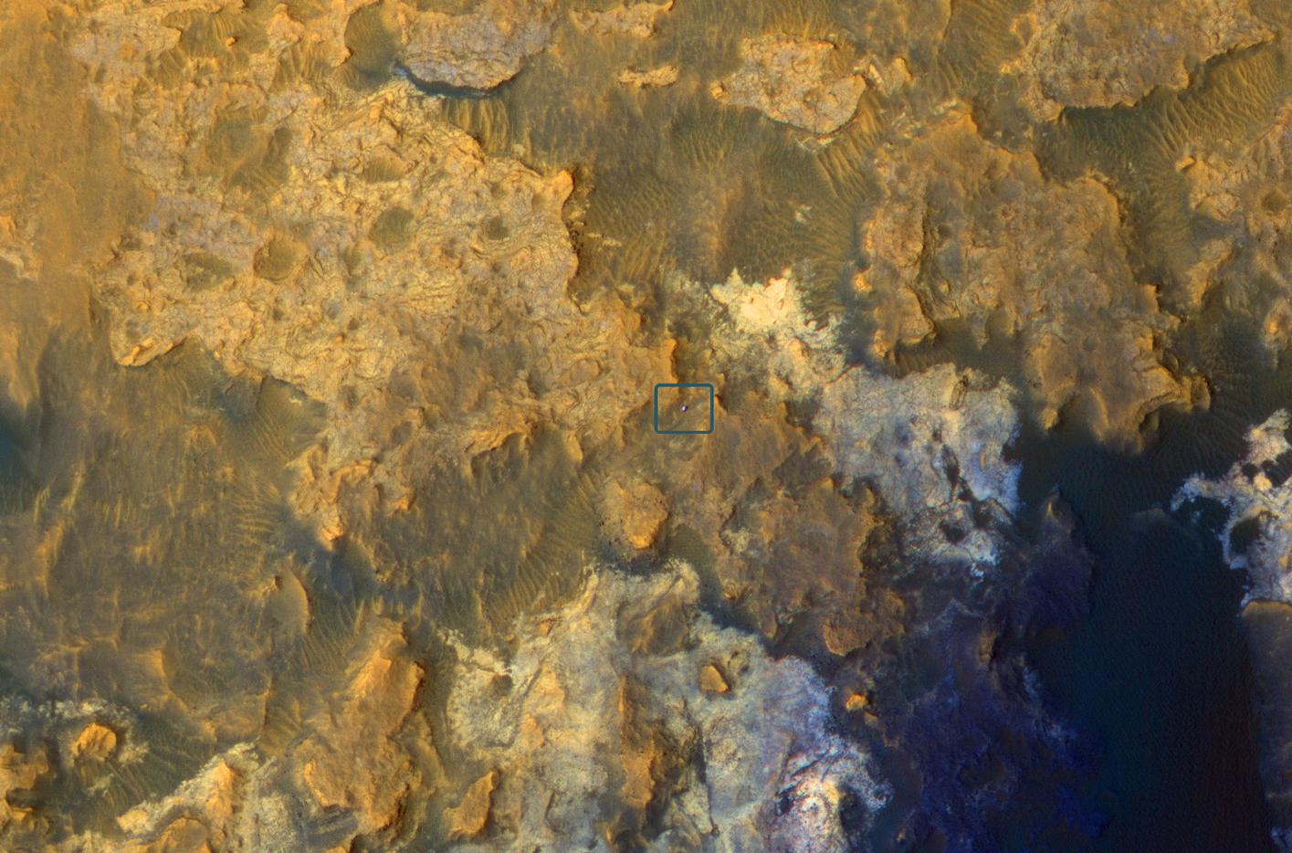 Mars Orbiter Sees Curiosity Rover in 'Artist's Drive'