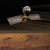 artist concept of Mars Reconnaissance Orbiter during aerobraking.