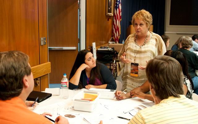 Sheri Klug Boonstra, director of the Mars Education Program at Arizona State University, leads a group of teachers through an analytical exercise.