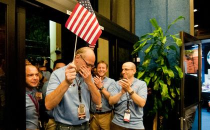 Miguel San Martin, Chief Engineer for Guidance, Navigation and Control for the Curiosity rover, pauses to hold back tears as he leads the Entry, Descent and Landing team into the post-landing news briefing.