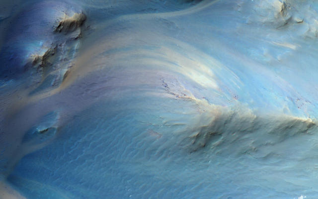 This is an image of a central pit of an impact crater in the Martian ancient highlands.