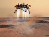 Artist concept of Phoenix landing on Mars.