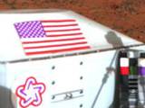 This color image shows the U.S. flag adorning the side of the Viking lander on the surface of Mars.