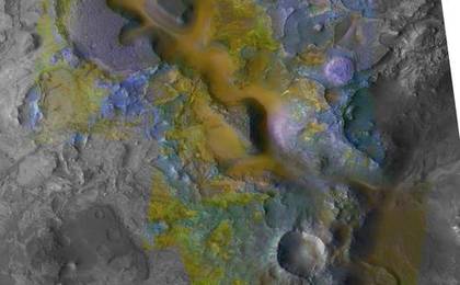 Carbonate, which is indicative of a wet and non-acidic history, occurs in very small patches of exposed rock appearing green in this color representation of an area about 20 kilometers (12 miles) wide on Mars.
