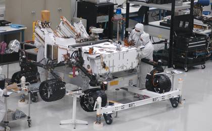 Mars rover Curiosity with newly installed wheels.