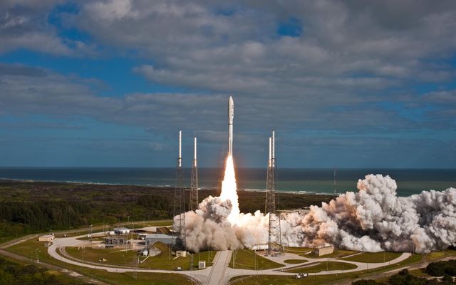 NASA's Mars Science Laboratory spacecraft, sealed inside its payload fairing atop the United Launch Alliance Atlas V rocket, clears the tower at Space Launch Complex 41 on Cape Canaveral Air Force Station in Florida.