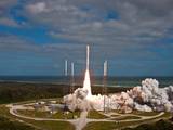 NASA's Mars Science Laboratory spacecraft, sealed inside its payload fairing atop the United Launch Alliance Atlas V rocket, clears the tower at Space Launch Complex 41 on Cape Canaveral Air Force Station in Florida.