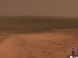 This panorama is the view NASA's Mars Exploration Rover Opportunity gained from the top of the "Cape Tribulation" segment of the rim of Endeavour Crater. The rover reached this point three weeks before the 11th anniversary of its January 2004 landing on Mars.