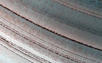 Icy Layers and Climate Fluctuations near the Martian North Pole
