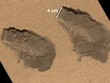 This is a view of the third (left) and fourth (right) trenches made by the 1.6-inch-wide (4-centimeter-wide) scoop on NASA's Mars rover Curiosity in October 2012.