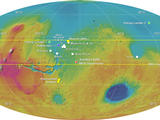 Global color map of Mars in an oval shape showing colors, which represent the highs and lows of Mars.  The landing sites for past missions are noted by stars and the four down selected landing sites for ExoMars are also noted.