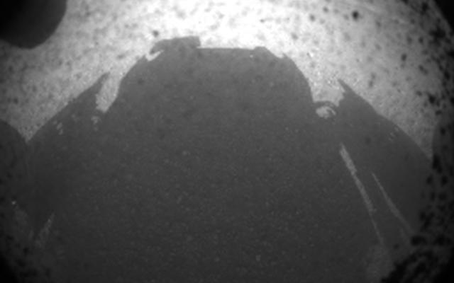 This is the first image taken by NASA's Curiosity rover, which landed on Mars the evening of Aug. 5 PDT (morning of Aug. 6 EDT).