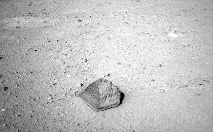 The drive by NASA's Mars rover Curiosity during the mission's 43rd Martian day, or sol, (Sept. 19, 2012) ended with this rock about 8 feet (2.5 meters) in front of the rover.