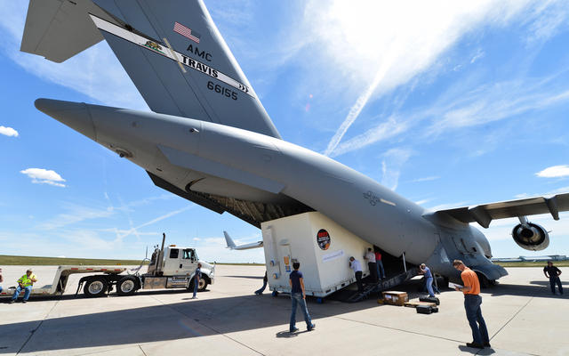 The MAVEN spacecraft is loaded into the belly of a C-17 Globemaster at Buckley Air Force Base in Aurora, Colorado on its way to Cape Canaveral, Florida, where it will be prepared for a November 18th launch date