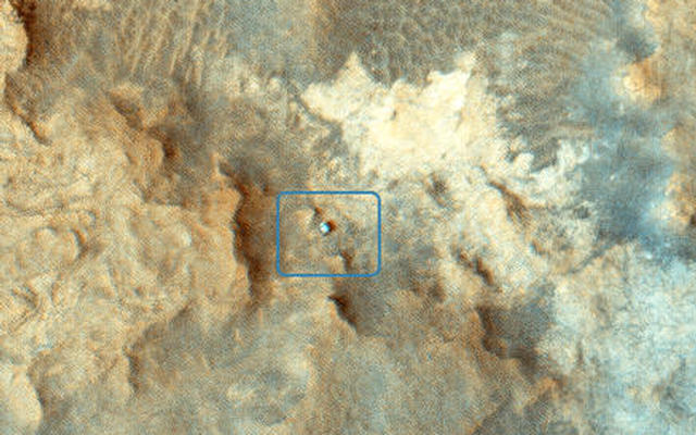 NASA's Curiosity Mars rover can be seen at the "Pahrump Hills" area of Gale Crater in this view from the High Resolution Imaging Science Experiment (HiRISE) camera on NASA's Mars Reconnaissance Orbiter.