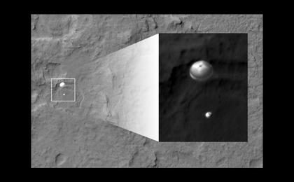 NASA's Curiosity rover and its parachute were spotted by NASA's Mars Reconnaissance Orbiter as Curiosity descended to the surface on Aug. 5 PDT (Aug. 6 EDT).