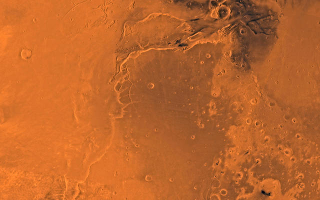 Mars digital-image mosaic merged with color of the MC-10 quadrangle, Lanae Palus region of Mars. The western part is dominated by lava flows of the Tharsis region. The central part includes ridged terrain of Lunae Planum. The west and north borders of Lunae Planum are dissected by the large, relatively young outflow channel, Kasei Vallis, which terminates in Chryse Planitia. Latitude range 0 to 30 degrees, longitude range 45 to 90 degrees.