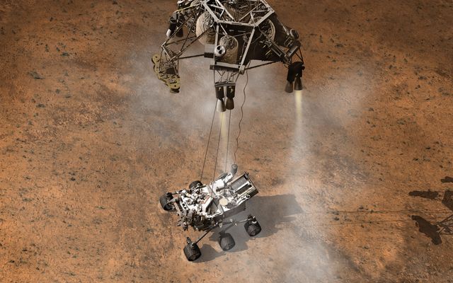 This artist's concept depicts the moment that NASA's Curiosity rover touches down onto the Martian surface.