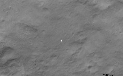 This set of images compares a black-and-white image from the High Resolution Imaging Science Experiment (HiRISE) aboard NASA's Mars Reconnaissance Orbiter to a color image obtained by the Mars Descent Imager aboard NASA's Curiosity rover during its descent to the surface.