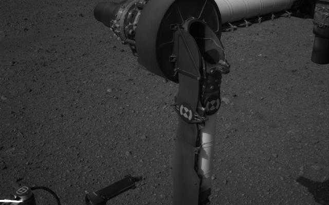 This full-resolution image from NASA's Curiosity shows the elbow joint of the rover's extended robotic arm on Aug. 20, 2012. The Navigation Camera captured this view.