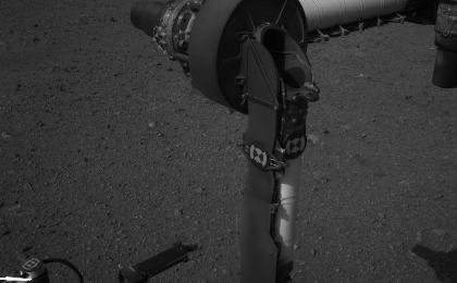 This full-resolution image from NASA's Curiosity shows the elbow joint of the rover's extended robotic arm on Aug. 20, 2012. The Navigation Camera captured this view.