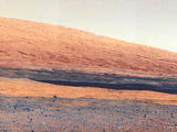 This image taken by the Mast Camera (MastCam) on NASA's Curiosity rover highlights the interesting geology of Mount Sharp, a mountain inside Gale Crater, where the rover landed.