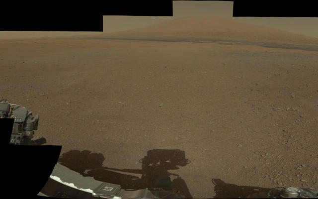 This color panorama shows a 360-degree view of the landing site of NASA's Curiosity rover, including the highest part of Mount Sharp visible to the rover. That part of Mount Sharp is approximately 12 miles (20 kilometers) away from the rover. .