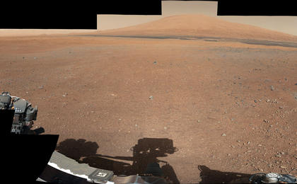 This color panorama shows a 360-degree view of the landing site of NASA's Curiosity rover, including the highest part of Mount Sharp visible to the rover. That part of Mount Sharp is approximately 12 miles (20 kilometers) away from the rover.