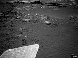 The team operating NASA's Mars Exploration Rover Opportunity plans to investigate rocks in this area photographed by the rover's navigation camera during the 3,057th Martian day, or sol, of Opportunity's work on Mars (Aug. 23, 2012).