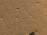The reclosable dust cover on Curiosity's Mars Hand Lens Imager (MAHLI) was opened for the first time during the 33rd Martian day, or sol, of the rover's mission on Mars (Sept. 8, 2012), enabling MAHLI to take this image.