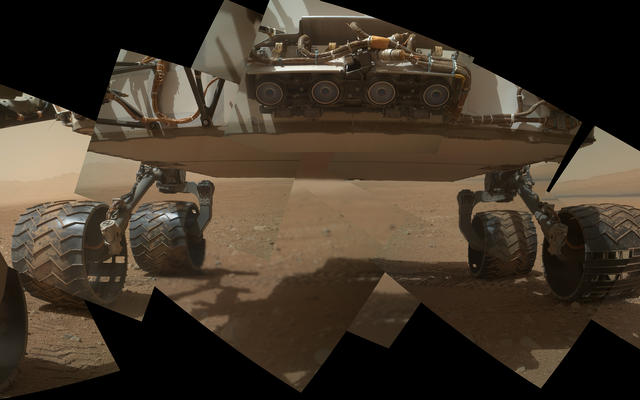 This view of the lower front and underbelly areas of NASA's Mars rover Curiosity combines nine images taken by the rover's  Mars Hand Lens Imager (MAHLI) during the 34th Martian day, or sol, of Curiosity's work on Mars (Sept. 9, 2012).