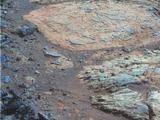 A rind that appears bluish in this false-color view covers portions of the surface of a rock called "Whitewater Lake" in the top half of the view from NASA's Mars Exploration Rover Opportunity.