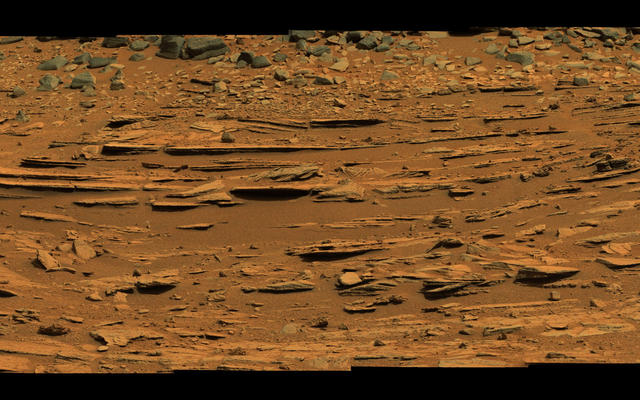 The "Shaler" outcrop is dramatically layered, as seen in this mosaic of telephoto images from the right Mast Camera (Mastcam) on NASA's Mars rover Curiosity.