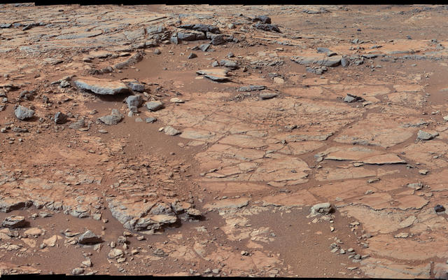 From a position in the shallow "Yellowknife Bay" depression, NASA's Mars rover Curiosity used its right Mast Camera (Mastcam) to take the telephoto images combined into this panorama of geological diversity.