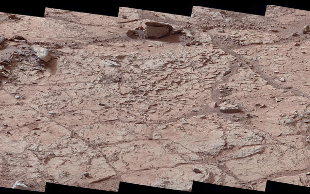 This wide view of the "John Klein" location selected for the first rock drilling by NASA's Mars rover Curiosity is a mosaic taken by Curiosity's right Mast Camera (Mastcam) during the afternoon of the 153rd Martian day, or sol, of the rover's work on Mars.