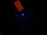 This image of a calibration target illuminated by ultraviolet LEDs (light emitting diodes) is part of the first set of nighttime images taken by the Mars Hand Lens Imager (MAHLI) camera at the end of the robotic arm of NASA's Mars rover Curiosity.