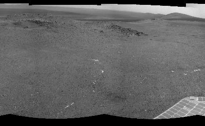 NASA's Mars Exploration Rover Opportunity used its navigation camera to record this view of a rise called "Nobbys Head" during a stop on a multi-week southward drive between two raised segments of the west rim of Endeavour Crater.