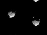 These six images from NASA's Mars rover Curiosity show the two moons of Mars moments before (left three) and after (right three) the larger moon, Phobos, occulted Deimos on Aug. 1, 2013.