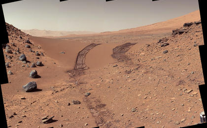 This look back at a dune that NASA's Curiosity Mars rover drove across was taken by the rover's Mast Camera (Mastcam) during the 538th Martian day, or sol, of Curiosity's work on Mars (Feb. 9, 2014).