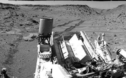 This panorama combining images taken on Feb. 10, 2014, by the Navigation Camera (Navcam) on NASA's Curiosity Mars rover looks back to where the rover crossed a dune at "Dingo Gap" four days earlier. The view is centered toward the east and spans about 225 degrees.