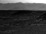 This image from NASA's Curiosity Mars rover, taken on April 3, 2014, includes a bright spot near the upper left corner. Possible explanations include  a glint from a rock or a cosmic-ray hit.