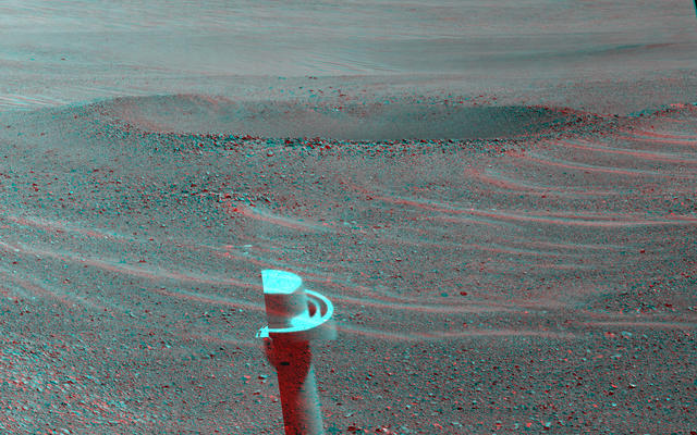 This stereo view from NASA's Mars Exploration Rover Opportunity shows "Lunokhod 2 Crater," which lies south of "Solander Point" on the west rim of Endeavour Crater.