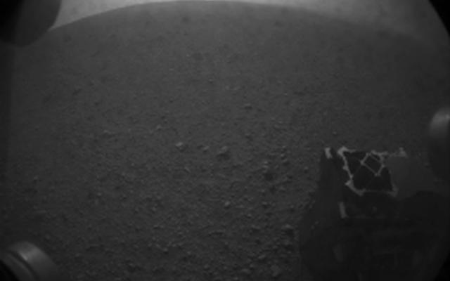 This is one of the first images taken by NASA's Curiosity rover, which landed on Mars the evening of Aug. 5 PDT (morning of Aug. 6 EDT).