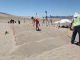 sand dune, mars rover, wheel, Dumont, Scarecrow, test - This image shows a row of uphill, white sand dunes that JPL engineers shape with long rakes for desert rover test, under blue skies.  The Scarecrow rover sits at the bottom, waiting to be tested.