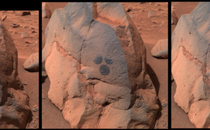 This image shows the rock dubbed "Humphrey" and the circular areas on the rock that were wiped off by the rover.