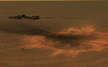 This stunning image features the heat shield impact site of NASA's Mars Exploration Rover Opportunity.