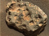 Opportunity  found an iron meteorite on Mars, the first meteorite of any type ever identified on another planet.